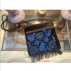 Black zip pouch crossbody handbag